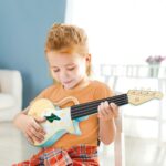 Bambina con ukulele rock hape e0626